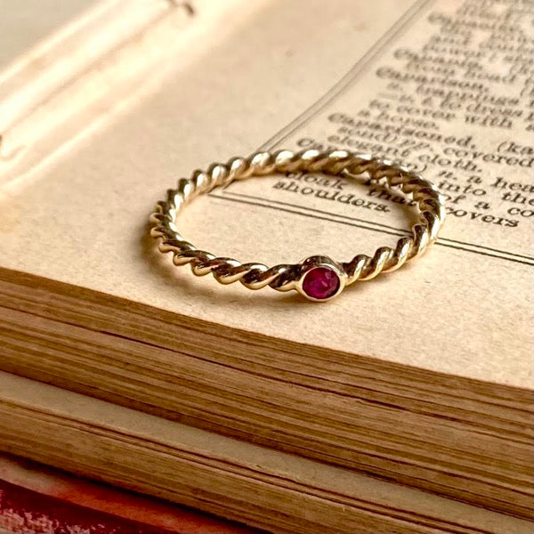 Solid Gold Fine Twist Ring with Ruby by Joy Everley